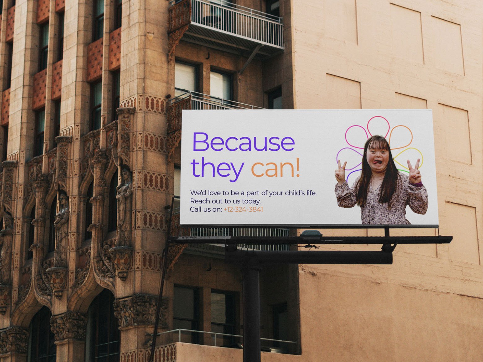 Inclusive Lifestyle’s rebranding case study: a billboard on the side of a building, advertising the company Inclusive Lifestyle. The billboard reads “Because they can!”