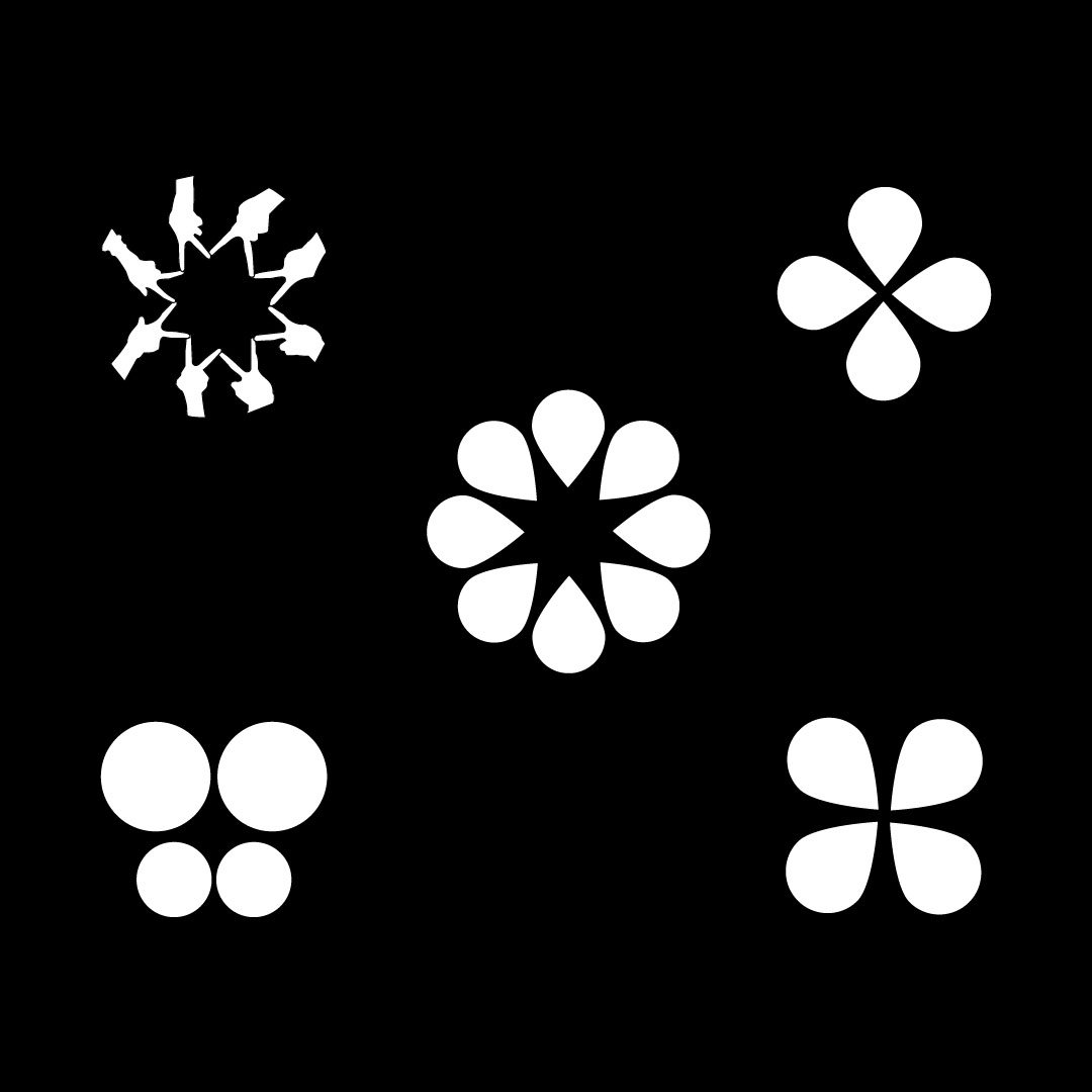 Five black and white Inclusive Lifestyle logo icons in the company’s rebranding case study. One has hands making inward-facing peace signs, another is a butterfly, and three are made of flower petals.