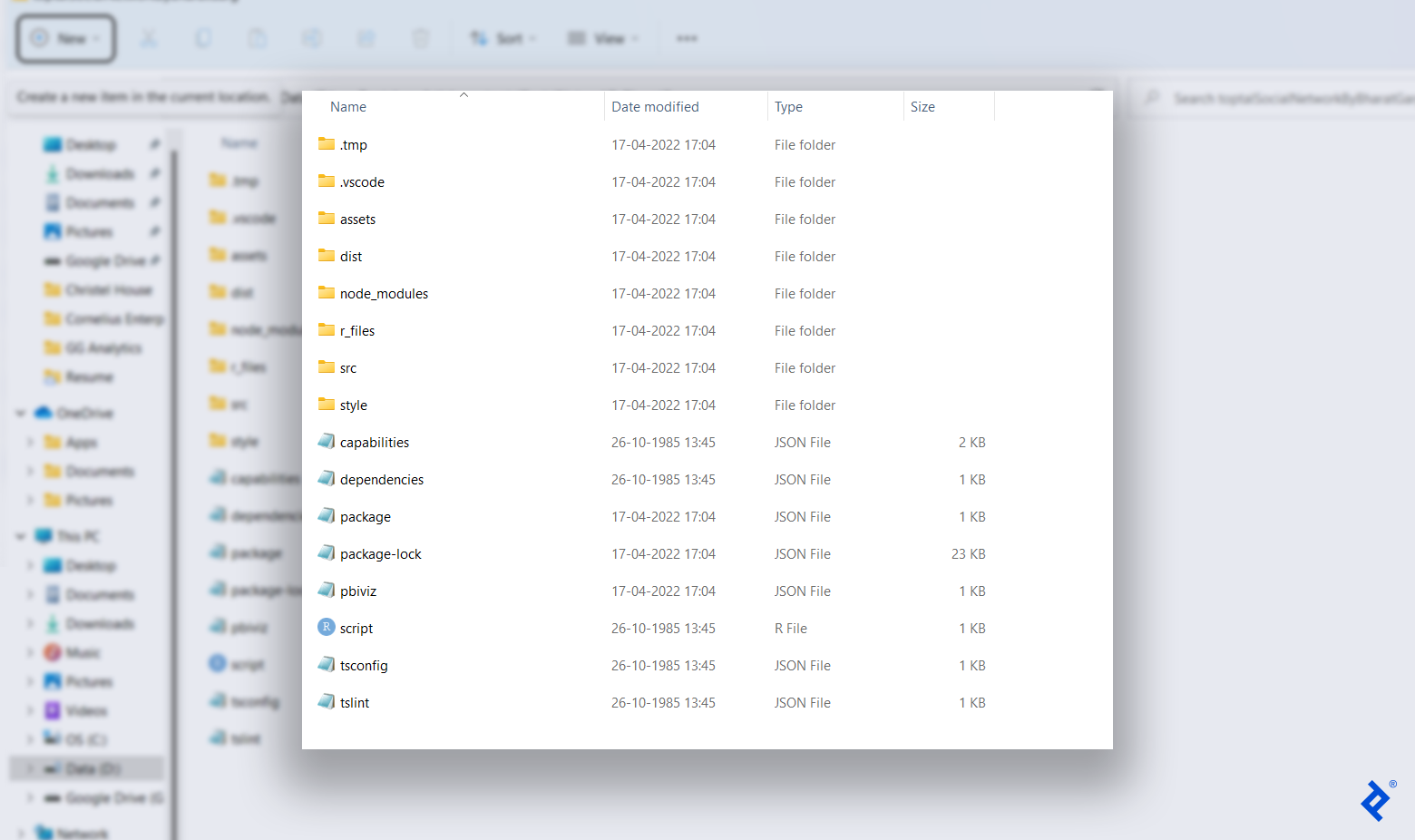 A File Explorer listing containing eight subfolders (.tmp, .vscode, assets, dist, node_modules, r_files, src, and style) and eight files (capabilities.json, dependencies.json, package.json, package-lock.json, pbiviz.json, script.r, tsconfig.json, and tslint.json). All of the files are 1 KB, except for capabilities.json (2 KB) and package-lock.json (23 KB).