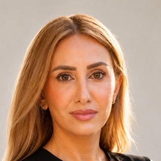 Asmahane Khawaja, Senior Web Designer.