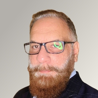 Farooq Agha, Senior Crystal Reports Programmer and Consultant.