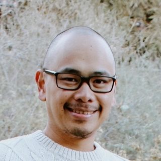 Elmer Tabby Taboada, digital strategy Copywriter.