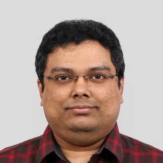 Amith George, Freelance Clojure Engineer.