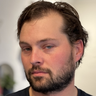 Evan Simmons, Senior Rust Programmer and Consultant.