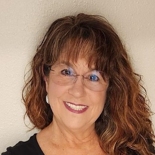 Jane B. Brewster, Executive Assistant Analyst.