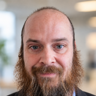 Xan Merritt, Senior ONNX Programmer and Consultant.