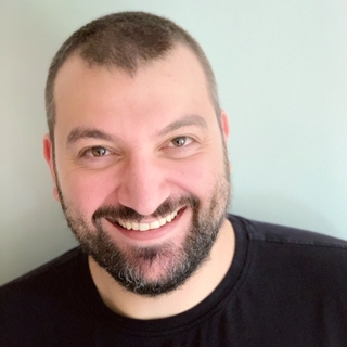 Robert Howell, Senior Mustache Programmer and Consultant.