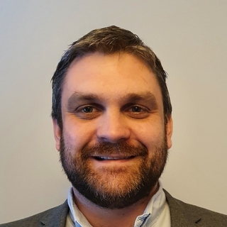 Dan Cook, Senior IT consulting Programmer and Consultant.