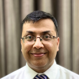 Manish Gupta, Independent Fractional CFO Consultant.