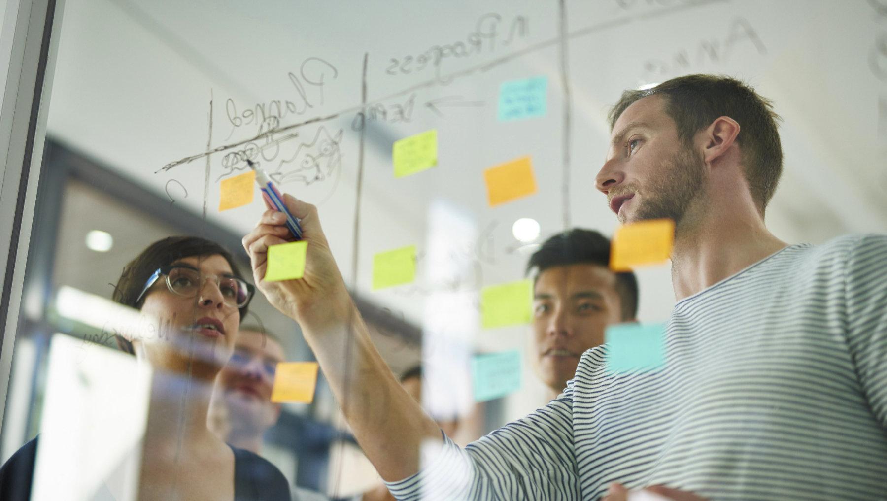 Designers working on a design strategy framework