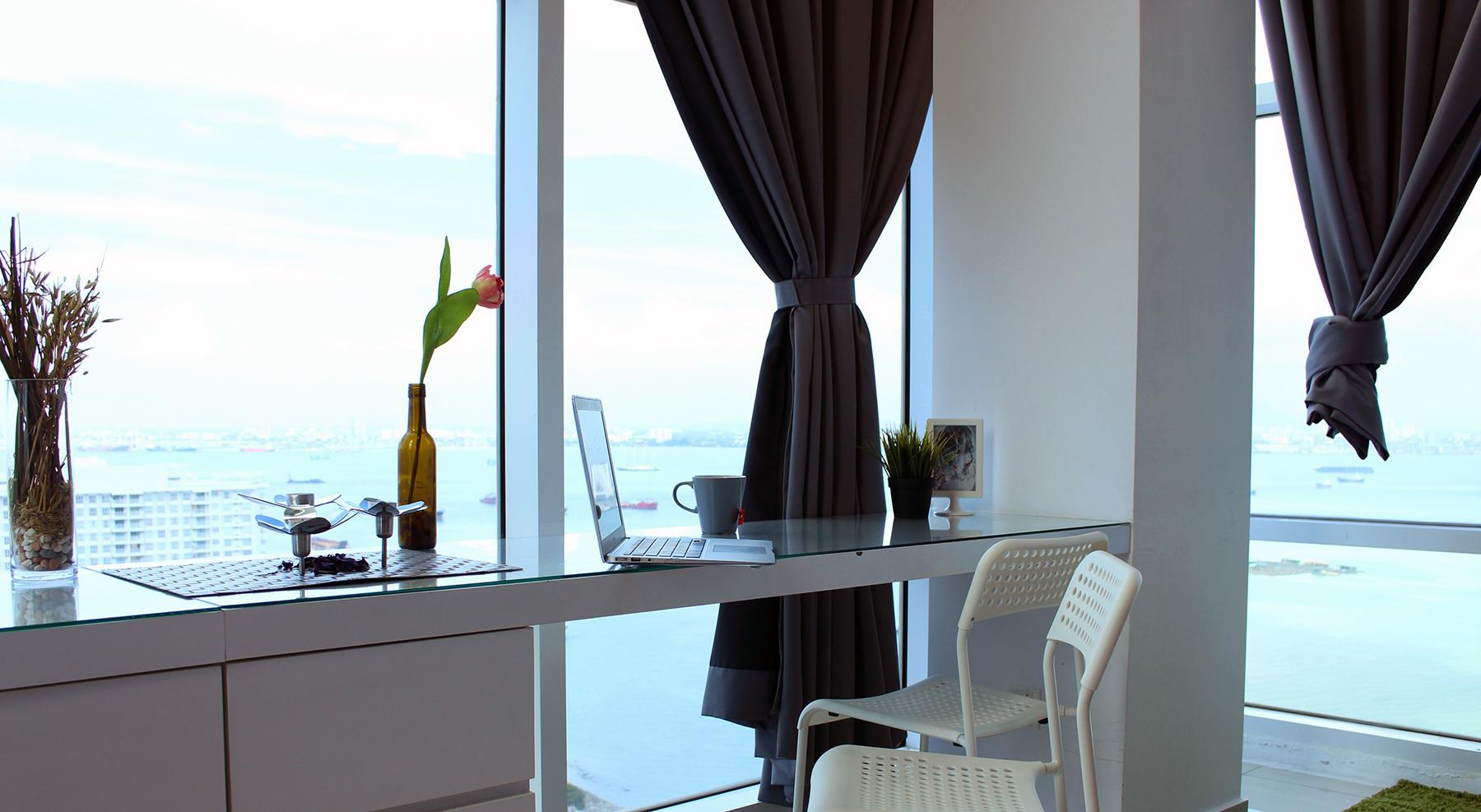 Freelance designer remote-working digital nomad setup.