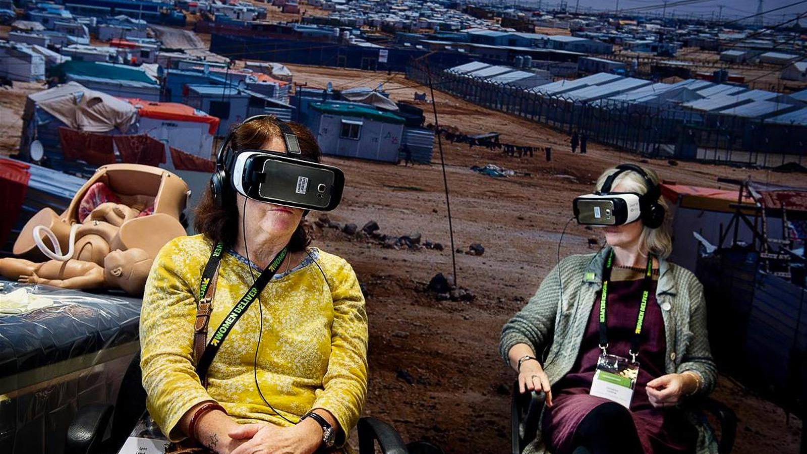 VR users projected in a 360 view of a refugees camp
