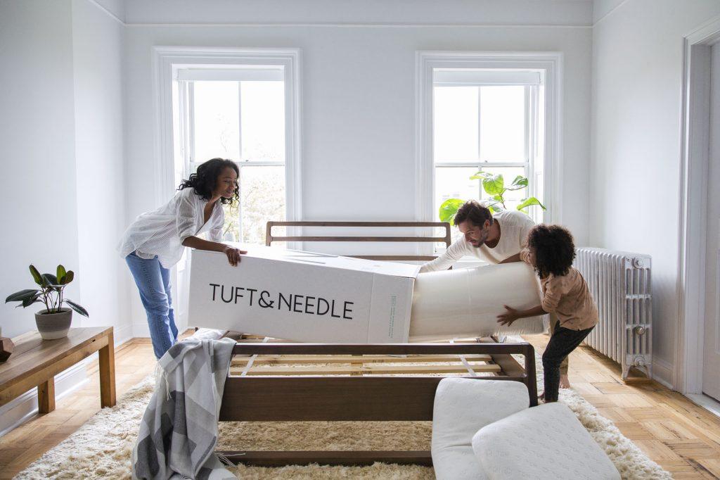 Unpacking a compressed mattress.