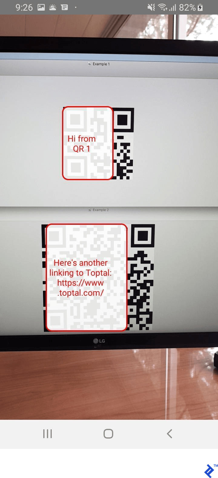 The same camera angle again, this time with the decoded messages overlaid atop their corresponding QR codes.