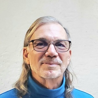 Charlie Cooper, Senior Cisco Programmer and Consultant.